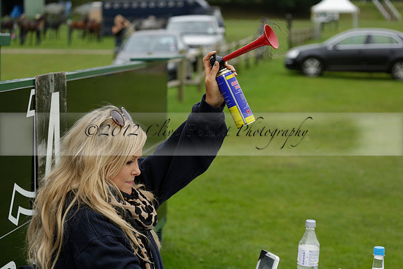 Four Quarters Black (black) v Clashleigh (red) in the Autumn Cup subsidiary final polo match on Ambersham 2 at Cowdray Park Polo Club on Sunday 22 September 2013 www.polopictures.co.uk