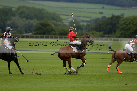 Four Quarters Black (black) v Clashleigh (red) in the Autumn Cup subsidiary final polo match on Ambersham 2 at Cowdray Park Polo Club on Sunday 22 September 2013 www.polopictures.co.uk