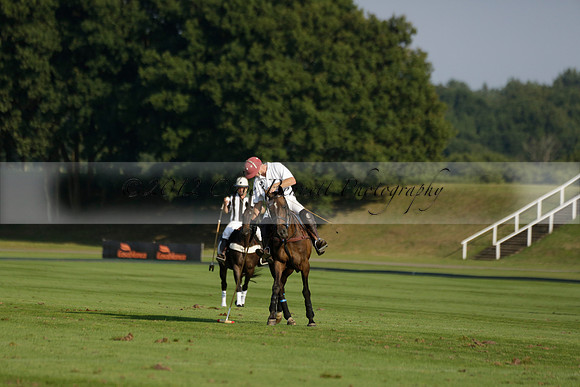 Pluma Negra (white) v Shoreline (black) in the Brecknock Cup Subsidiary final polo match played on Sunday 25 August 2013 at Cowdray Park Polo Club on Ambersham 1. 2013.10.12 www.polopictures.co.uk