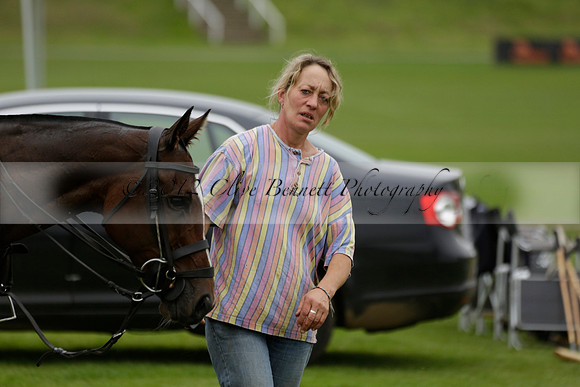 Four Quarters Black (black) v Clashleigh (red) in the Autumn Cup subsidiary final polo match on Ambersham 2 at Cowdray Park Polo Club on Sunday 22 September 2013 www.polopictures.co.uk