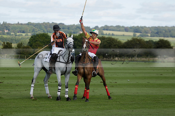 Four Quarters Black (black) v BHC (red) in a Autumn Cup polo match on Ambersham 2 at Cowdray Park Polo Club on Friday 20 September 2013 www.polopictures.co.uk