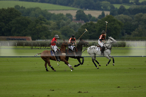 Four Quarters Black (black) v Clashleigh (red) in the Autumn Cup subsidiary final polo match on Ambersham 2 at Cowdray Park Polo Club on Sunday 22 September 2013 www.polopictures.co.uk