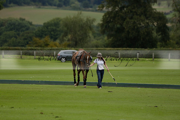 Four Quarters Black (black) v Clashleigh (red) in the Autumn Cup subsidiary final polo match on Ambersham 2 at Cowdray Park Polo Club on Sunday 22 September 2013 www.polopictures.co.uk