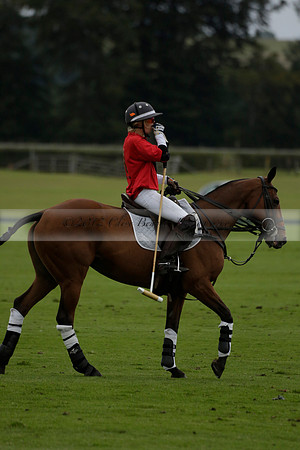 Four Quarters Black (black) v Clashleigh (red)in a Jaeger Le Coultre Autumn Cup polo match played on Ambersham 2 at Cowdray Park Polo Club on Wednesday 2013.09.11 www.polopictures.co.uk