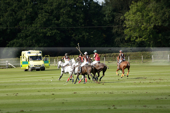 Four Quarters Black (black) v BHC (red) in a Autumn Cup polo match on Ambersham 2 at Cowdray Park Polo Club on Friday 20 September 2013 www.polopictures.co.uk