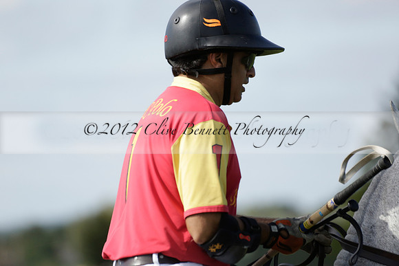 Four Quarters Black (black) v BHC (red) in a Autumn Cup polo match on Ambersham 2 at Cowdray Park Polo Club on Friday 20 September 2013 www.polopictures.co.uk