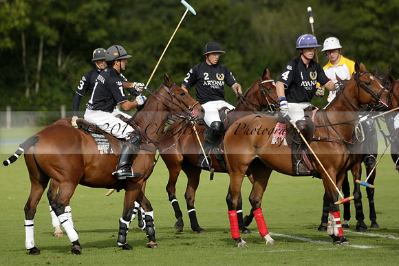 Aryana (black) v Shoreline (yellow) in a Farewell Cup polo match played on Ambersham 5 at Cowdray Park Polo Club on Wednesday 18 September 2013. www.polopictures.co.uk
