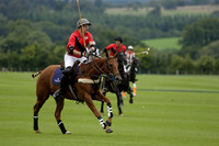 Four Quarters Black (black) v Clashleigh (red) in the Autumn Cup subsidiary final polo match on Ambersham 2 at Cowdray Park Polo Club on Sunday 22 September 2013 www.polopictures.co.uk