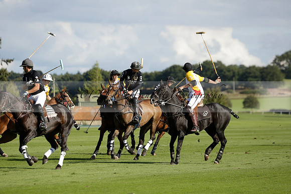 Aryana (black) v Shoreline (yellow) in a Farewell Cup polo match played on Ambersham 5 at Cowdray Park Polo Club on Wednesday 18 September 2013. www.polopictures.co.uk