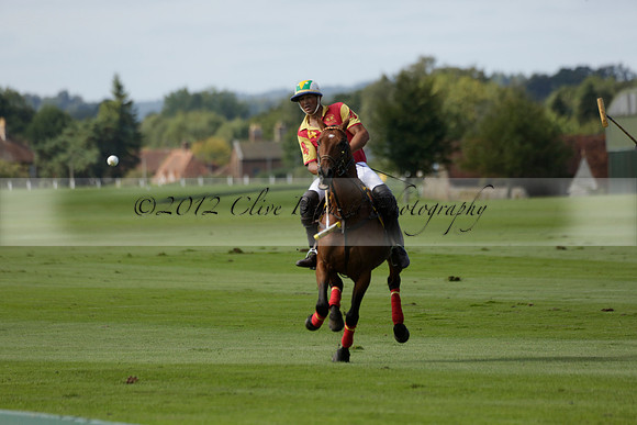 Four Quarters Black (black) v BHC (red) in a Autumn Cup polo match on Ambersham 2 at Cowdray Park Polo Club on Friday 20 September 2013 www.polopictures.co.uk