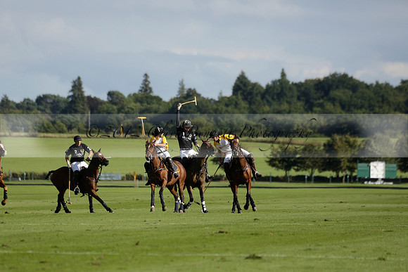 Aryana (black) v Shoreline (yellow) in a Farewell Cup polo match played on Ambersham 5 at Cowdray Park Polo Club on Wednesday 18 September 2013. www.polopictures.co.uk