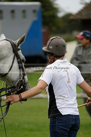 Four Quarters Black (black) v Clashleigh (red) in the Autumn Cup subsidiary final polo match on Ambersham 2 at Cowdray Park Polo Club on Sunday 22 September 2013 www.polopictures.co.uk