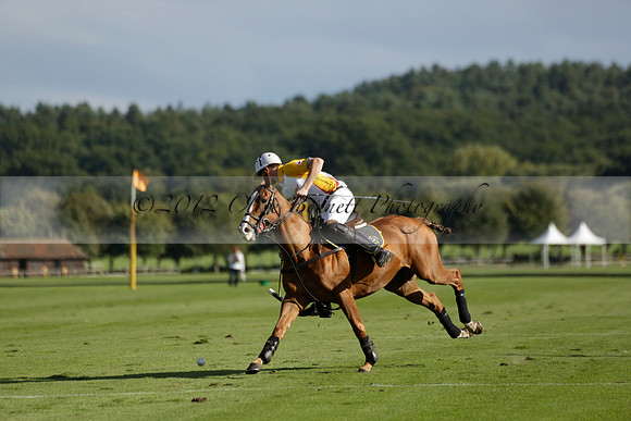 Aryana (black) v Shoreline (yellow) in a Farewell Cup polo match played on Ambersham 5 at Cowdray Park Polo Club on Wednesday 18 September 2013. www.polopictures.co.uk