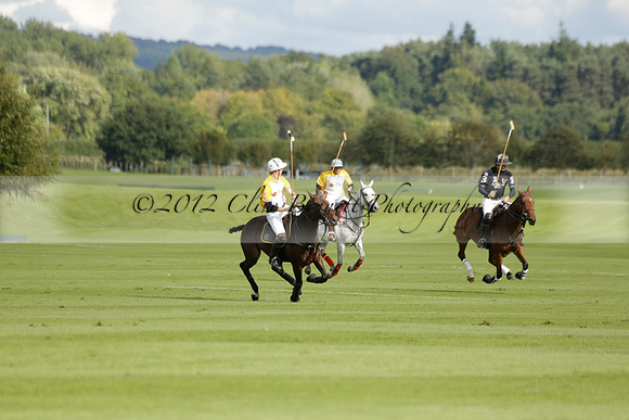 Aryana (black) v Shoreline (yellow) in a Farewell Cup polo match played on Ambersham 5 at Cowdray Park Polo Club on Wednesday 18 September 2013. www.polopictures.co.uk