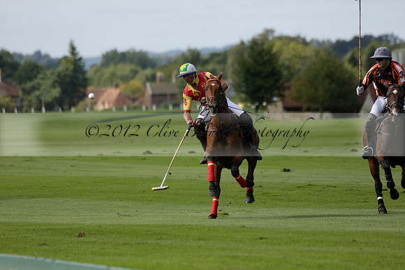 Four Quarters Black (black) v BHC (red) in a Autumn Cup polo match on Ambersham 2 at Cowdray Park Polo Club on Friday 20 September 2013 www.polopictures.co.uk