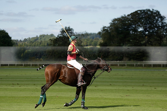 Four Quarters Black (black) v BHC (red) in a Autumn Cup polo match on Ambersham 2 at Cowdray Park Polo Club on Friday 20 September 2013 www.polopictures.co.uk