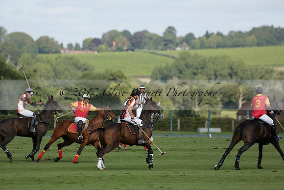 Four Quarters Black (black) v BHC (red) in a Autumn Cup polo match on Ambersham 2 at Cowdray Park Polo Club on Friday 20 September 2013 www.polopictures.co.uk