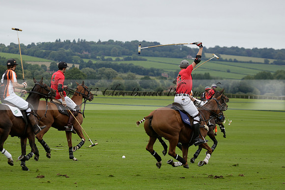 Four Quarters Black (black) v Clashleigh (red) in the Autumn Cup subsidiary final polo match on Ambersham 2 at Cowdray Park Polo Club on Sunday 22 September 2013 www.polopictures.co.uk