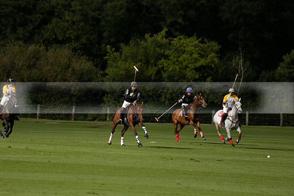 Aryana (black) v Shoreline (yellow) in a Farewell Cup polo match played on Ambersham 5 at Cowdray Park Polo Club on Wednesday 18 September 2013. www.polopictures.co.uk