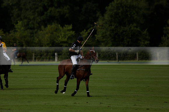 Aryana (black) v Shoreline (yellow) in a Farewell Cup polo match played on Ambersham 5 at Cowdray Park Polo Club on Wednesday 18 September 2013. www.polopictures.co.uk