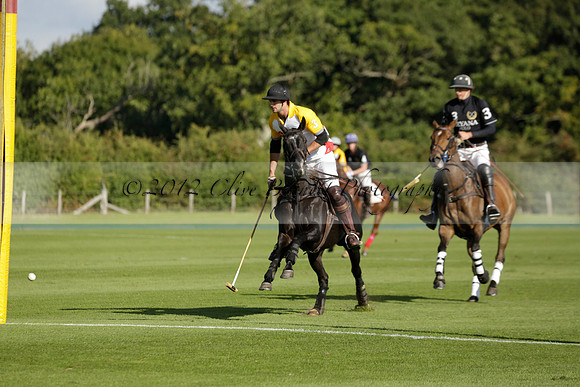 Aryana (black) v Shoreline (yellow) in a Farewell Cup polo match played on Ambersham 5 at Cowdray Park Polo Club on Wednesday 18 September 2013. www.polopictures.co.uk