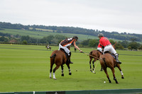 Four Quarters Black (black) v Clashleigh (red) in the Autumn Cup subsidiary final polo match on Ambersham 2 at Cowdray Park Polo Club on Sunday 22 September 2013 www.polopictures.co.uk