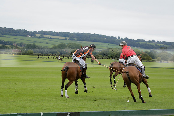 Four Quarters Black (black) v Clashleigh (red) in the Autumn Cup subsidiary final polo match on Ambersham 2 at Cowdray Park Polo Club on Sunday 22 September 2013 www.polopictures.co.uk
