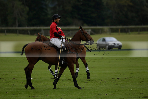 Four Quarters Black (black) v Clashleigh (red)in a Jaeger Le Coultre Autumn Cup polo match played on Ambersham 2 at Cowdray Park Polo Club on Wednesday 2013.09.11 www.polopictures.co.uk