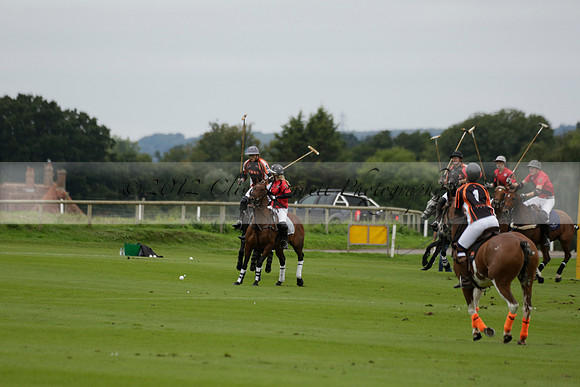 Four Quarters Black (black) v Clashleigh (red) in the Autumn Cup subsidiary final polo match on Ambersham 2 at Cowdray Park Polo Club on Sunday 22 September 2013 www.polopictures.co.uk