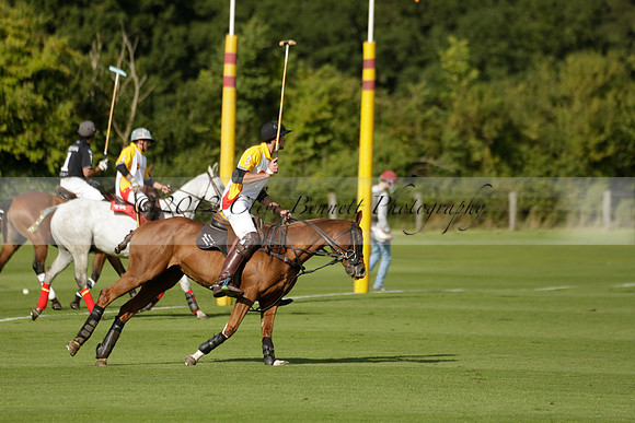 Aryana (black) v Shoreline (yellow) in a Farewell Cup polo match played on Ambersham 5 at Cowdray Park Polo Club on Wednesday 18 September 2013. www.polopictures.co.uk