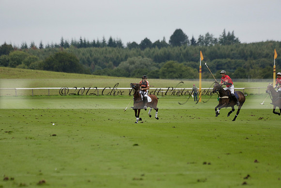 Four Quarters Black (black) v Clashleigh (red) in the Autumn Cup subsidiary final polo match on Ambersham 2 at Cowdray Park Polo Club on Sunday 22 September 2013 www.polopictures.co.uk