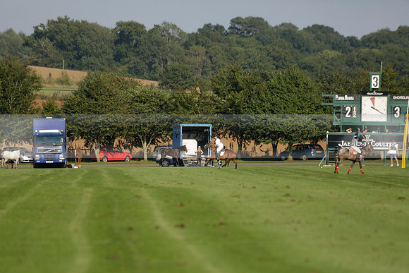 Pluma Negra (white) v Shoreline (black) in the Brecknock Cup Subsidiary final polo match played on Sunday 25 August 2013 at Cowdray Park Polo Club on Ambersham 1. 2013.10.12 www.polopictures.co.uk