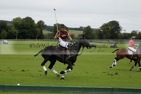 Four Quarters Black (black) v Clashleigh (red) in the Autumn Cup subsidiary final polo match on Ambersham 2 at Cowdray Park Polo Club on Sunday 22 September 2013 www.polopictures.co.uk
