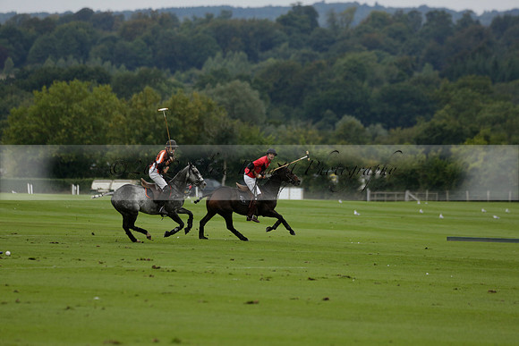 Four Quarters Black (black) v Clashleigh (red) in the Autumn Cup subsidiary final polo match on Ambersham 2 at Cowdray Park Polo Club on Sunday 22 September 2013 www.polopictures.co.uk
