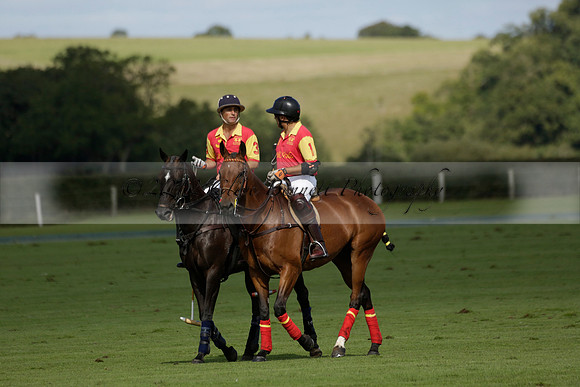 Four Quarters Black (black) v BHC (red) in a Autumn Cup polo match on Ambersham 2 at Cowdray Park Polo Club on Friday 20 September 2013 www.polopictures.co.uk