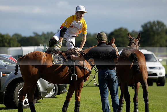 Aryana (black) v Shoreline (yellow) in a Farewell Cup polo match played on Ambersham 5 at Cowdray Park Polo Club on Wednesday 18 September 2013. www.polopictures.co.uk