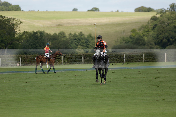 Four Quarters Black (black) v BHC (red) in a Autumn Cup polo match on Ambersham 2 at Cowdray Park Polo Club on Friday 20 September 2013 www.polopictures.co.uk