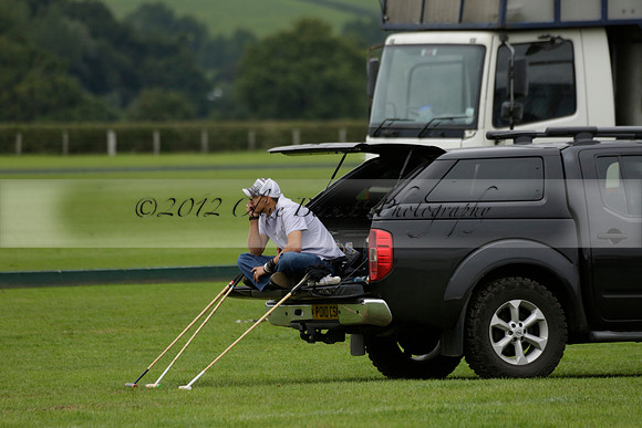 Four Quarters Black (black) v Clashleigh (red) in the Autumn Cup subsidiary final polo match on Ambersham 2 at Cowdray Park Polo Club on Sunday 22 September 2013 www.polopictures.co.uk