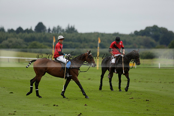 Four Quarters Black (black) v Clashleigh (red) in the Autumn Cup subsidiary final polo match on Ambersham 2 at Cowdray Park Polo Club on Sunday 22 September 2013 www.polopictures.co.uk
