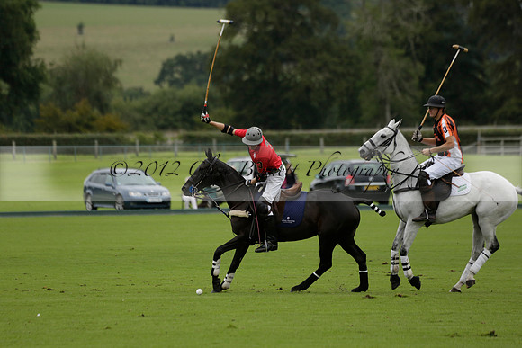 Four Quarters Black (black) v Clashleigh (red) in the Autumn Cup subsidiary final polo match on Ambersham 2 at Cowdray Park Polo Club on Sunday 22 September 2013 www.polopictures.co.uk