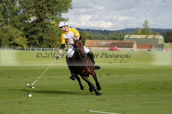 Aryana (black) v Shoreline (yellow) in a Farewell Cup polo match played on Ambersham 5 at Cowdray Park Polo Club on Wednesday 18 September 2013. www.polopictures.co.uk