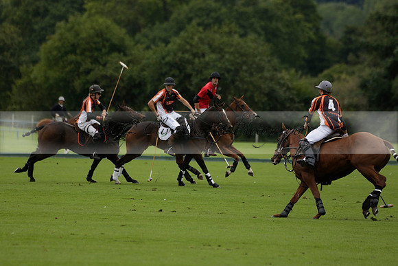 Four Quarters Black (black) v Clashleigh (red) in the Autumn Cup subsidiary final polo match on Ambersham 2 at Cowdray Park Polo Club on Sunday 22 September 2013 www.polopictures.co.uk