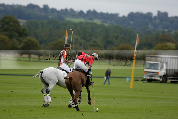 Four Quarters Black (black) v Clashleigh (red) in the Autumn Cup subsidiary final polo match on Ambersham 2 at Cowdray Park Polo Club on Sunday 22 September 2013 www.polopictures.co.uk
