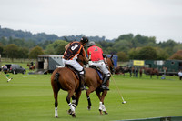 Four Quarters Black (black) v Clashleigh (red) in the Autumn Cup subsidiary final polo match on Ambersham 2 at Cowdray Park Polo Club on Sunday 22 September 2013 www.polopictures.co.uk