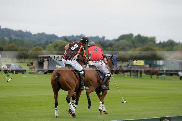 Four Quarters Black (black) v Clashleigh (red) in the Autumn Cup subsidiary final polo match on Ambersham 2 at Cowdray Park Polo Club on Sunday 22 September 2013 www.polopictures.co.uk