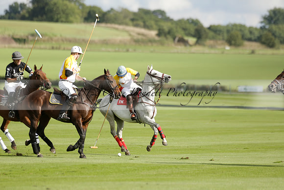 Aryana (black) v Shoreline (yellow) in a Farewell Cup polo match played on Ambersham 5 at Cowdray Park Polo Club on Wednesday 18 September 2013. www.polopictures.co.uk