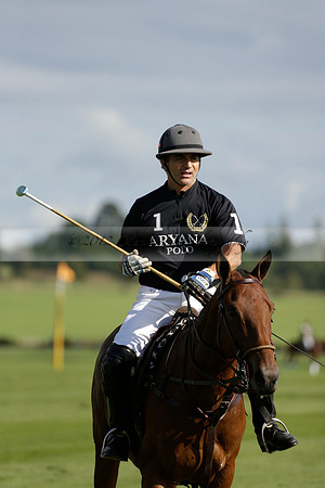 Aryana (black) v Shoreline (yellow) in a Farewell Cup polo match played on Ambersham 5 at Cowdray Park Polo Club on Wednesday 18 September 2013. www.polopictures.co.uk
