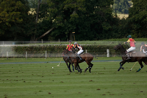 Four Quarters Black (black) v BHC (red) in a Autumn Cup polo match on Ambersham 2 at Cowdray Park Polo Club on Friday 20 September 2013 www.polopictures.co.uk