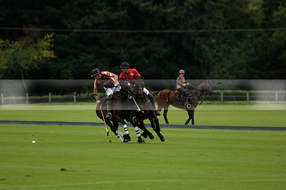 Four Quarters Black (black) v Clashleigh (red) in the Autumn Cup subsidiary final polo match on Ambersham 2 at Cowdray Park Polo Club on Sunday 22 September 2013 www.polopictures.co.uk
