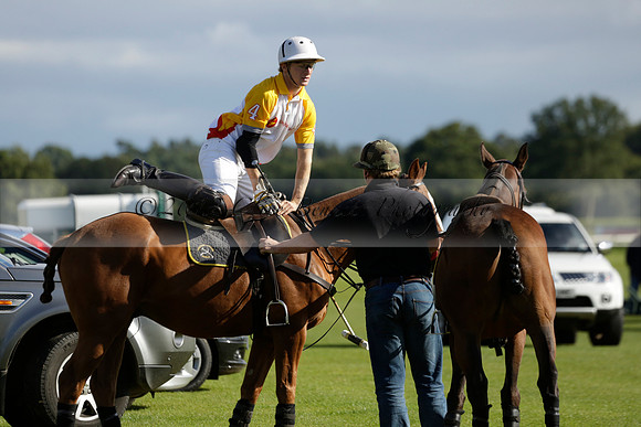 Aryana (black) v Shoreline (yellow) in a Farewell Cup polo match played on Ambersham 5 at Cowdray Park Polo Club on Wednesday 18 September 2013. www.polopictures.co.uk